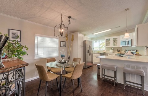 Edgewater House | Experience The Dancing Dolphin Retreat: Perfect for Families