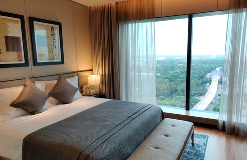 Thigalarapalya Hotel | Elegant The Den Bengaluru: 5-Star Stay with Spa & Pool