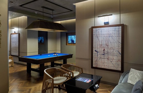 Thigalarapalya Hotel | Elegant The Den Bengaluru: 5-Star Stay with Spa & Pool