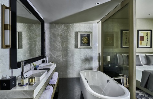 Thigalarapalya Hotel | Elegant The Den Bengaluru: 5-Star Stay with Spa & Pool