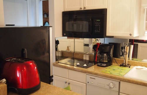 Jekyll Island Apartment | Experience The Dollyanna: Guest Rated 9.8 with Pool & Spa