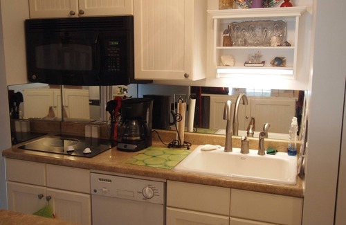 Jekyll Island Apartment | Experience The Dollyanna: Guest Rated 9.8 with Pool & Spa