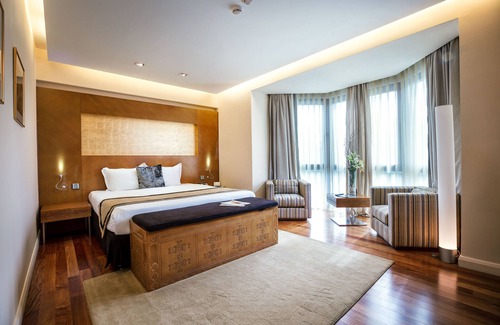 Almaty Hotel | Discover The Dostyk Hotel: 5-Star Comfort with Spa & Pool