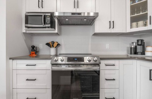 Southeast Calgary House | Discover The Duke: Upscale Comfort Near Downtown & Amenities
