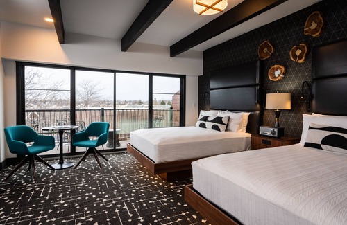 Charlevoix Hotel | Experience The Earl: Eco-Friendly Stay with Pool & Spa