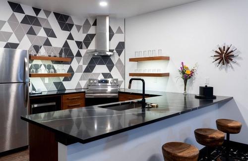 Charlevoix Hotel | Experience The Earl: Eco-Friendly Stay with Pool & Spa