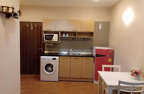 Chang Phueak Condo | Cozy Earth Tone Room with Pool Access for Your Getaway