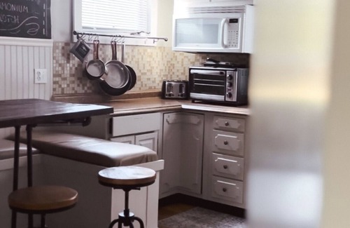 Champaign Apartment | Experience The Edge: Double King Suite with Family Amenities