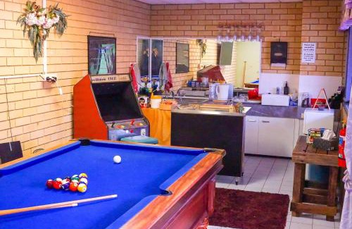 Goonellabah House | Discover The Edge Guest Rooms with Pool and Spa Amenities