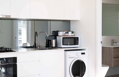 Orange Apartment | Discover The Elm Apartments: Family-Friendly Cowhide Room