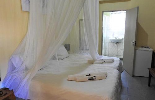 Outjo House | Cozy Farmhouse Boutique Guesthouse with Pool & Beergarden