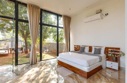 Bhongir Villa | The Farmstays CHRPoolGlass RoomsACWi-FiLawn
