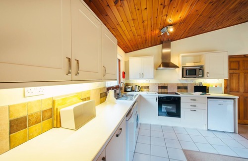 Crianlarich House | Relax at The Fisher: Pet-Friendly with Pool & Dining