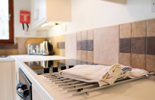 Crianlarich House | Relax at The Fisher: Pet-Friendly with Pool & Dining