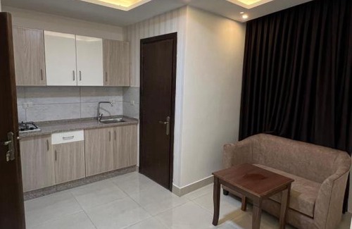 Suwailih Apartment | Convenient Family Retreat: The Flame for Rent Awaits