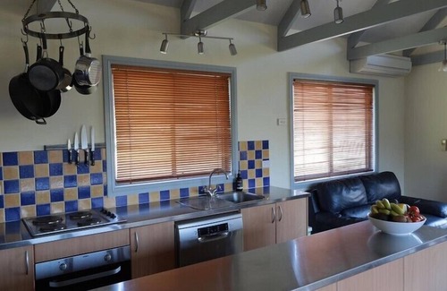Bandon Grove Cabin | Relax at Nest Cabin: Pool, Spa & Hot Tub Await You