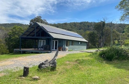 Bandon Grove Cabin | Relax at Nest Cabin: Pool, Spa & Hot Tub Await You