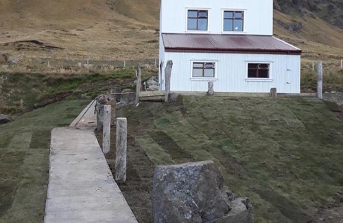 Varmahli Apartment | Top-Rated Stay at The Garage with Hot Tub & Family Amenities