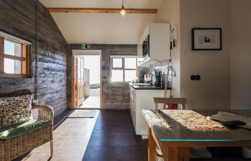 Varmahli Apartment | Top-Rated Stay at The Garage with Hot Tub & Family Amenities