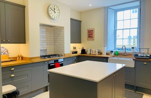 Bridport Apartment | Elegant Georgian Garden Flat with Breakfast & Family Amenities