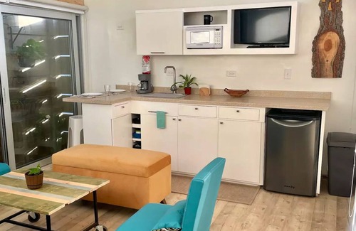 Ensenada House | Discover The Garden Glass House: Nature & Family-Friendly Stay