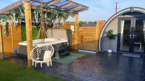 Buncrana Ski Chalet | Discover The Garden Pod: Private Hot Tub & Pet Friendly