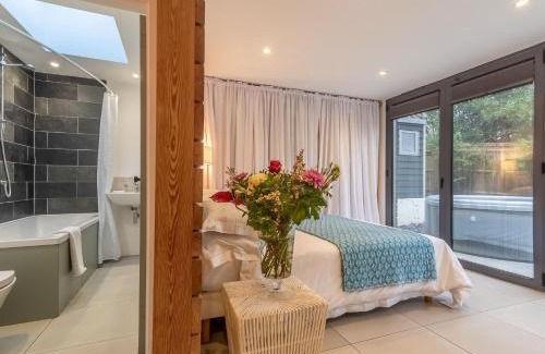 Plumpton Green House | Discover The Garden Room: Pet-Friendly Retreat Awaits