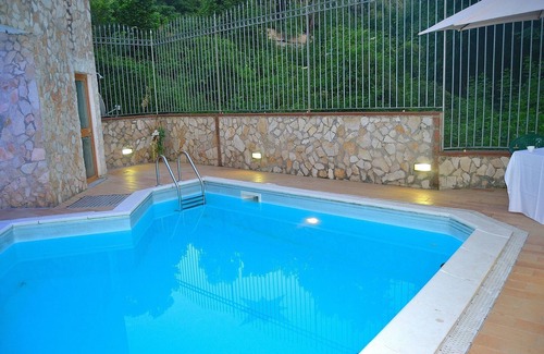 Naples Apartment | Relax at The Gardens of Capodimonte: Pool & Wi-Fi Included
