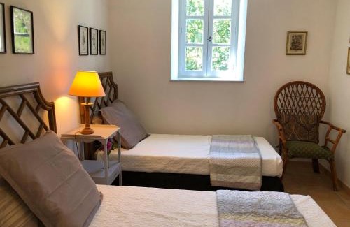 Castres House | Ideal 2 Bedroom Gite with Shared Pool and Ocean Views