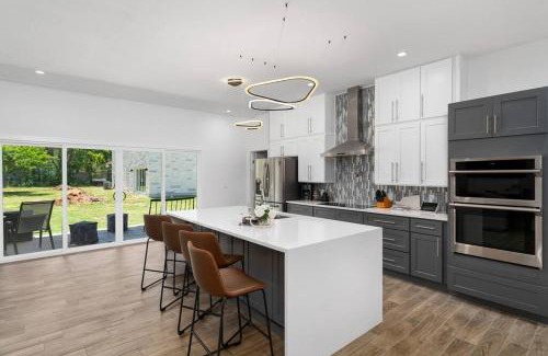 McNeil House | Discover The Gateway: 6-Bedroom Getaway with Pool & Game Room