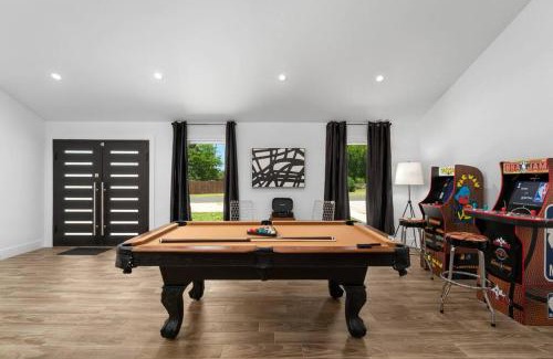 McNeil House | Discover The Gateway: 6-Bedroom Getaway with Pool & Game Room