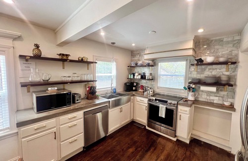 Topeka House | Discover The Ginger Bread House: Guest Rated 9.8 with King Beds