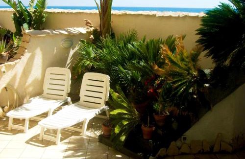 Agnone Bagni Apartment | Experience The Golden Rainbow - Seafront Apartments Awaits