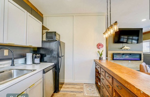 Ludington Apartment | The Goldfish is waterfront on PM Lake, Boat Docks, Fire Pit, 1 mile to downtown