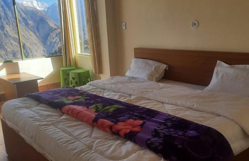 Auli House | Budget-Friendly Comfort at The Grand Apple - Pet Friendly Stay
