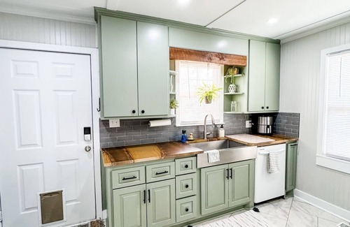 Searcy House | Indulge at The Grate House: Fire Table & Fenced Yard Retreat