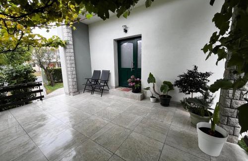 Postojna Apartment | Inviting Green Door Apartment: Guest Rated 9.5, Pet Friendly