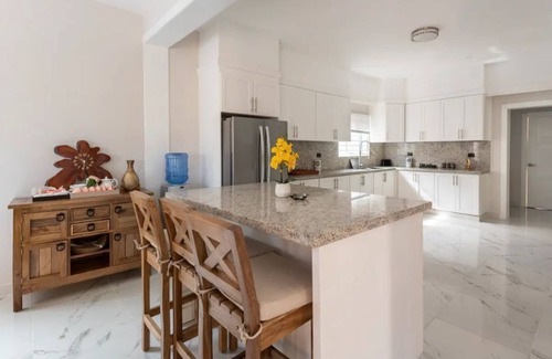 Villa Belen House | Discover The Green Palms Villa with Private Pool & Garden