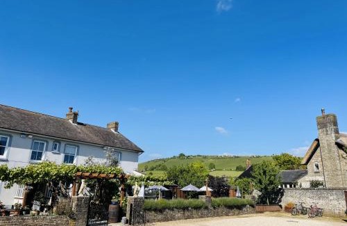 Sydling St Nicholas Hotel | Pet Friendly Retreat at The Greyhound Inn - Rated 8.4/10