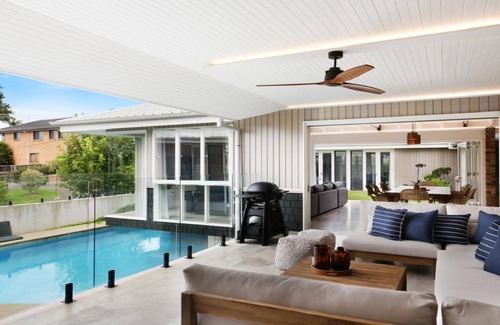 Wamberal House | Relax at The Grove: Poolside Retreat Steps from the Beach