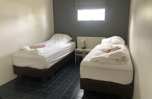 Thingeyri House | Cozy Guesthouse by the Fjord with Family-Friendly Amenities