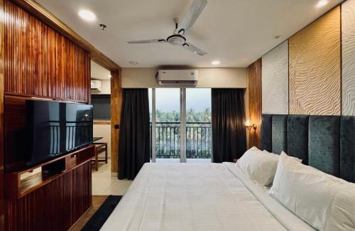 Kuppaayil Hotel | Discover The Habitat Suites: Family-Friendly with Pool