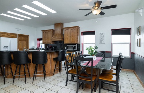Haslet House | Experience a Unique Stay in an Active Airplane Hangar