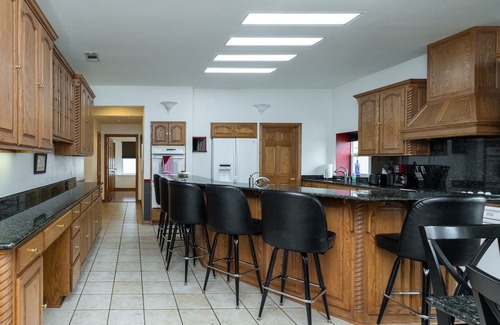 Haslet House | Experience a Unique Stay in an Active Airplane Hangar
