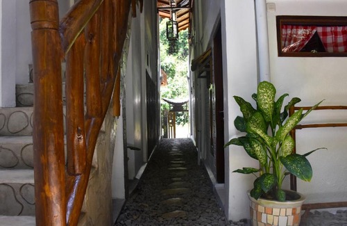 Bukit Lawang Hotel | EcoTravel Escape: Private Beach & Ocean View Awaits!