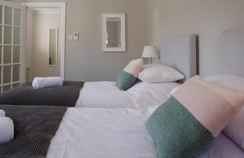 Dunbar House | Inviting Haven: Pet-Friendly Retreat with 9/10 Guest Rating