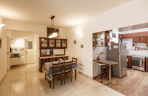 Bengaluru Condo | Cozy Haven Suite with Pool & Kitchen for Your Getaway