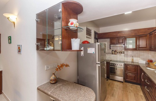 Bengaluru Condo | Cozy Haven Suite with Pool & Kitchen for Your Getaway