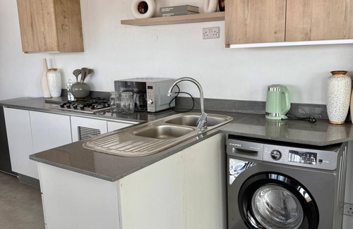 Harare East Apartment | The Hayhill Treetop Escape Apartment offers scenic views overlooking Harare.