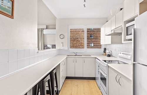 Nelson Bay Apartment | Discover The Helm: Steps to Shoal Bay Beach & Ocean Views
